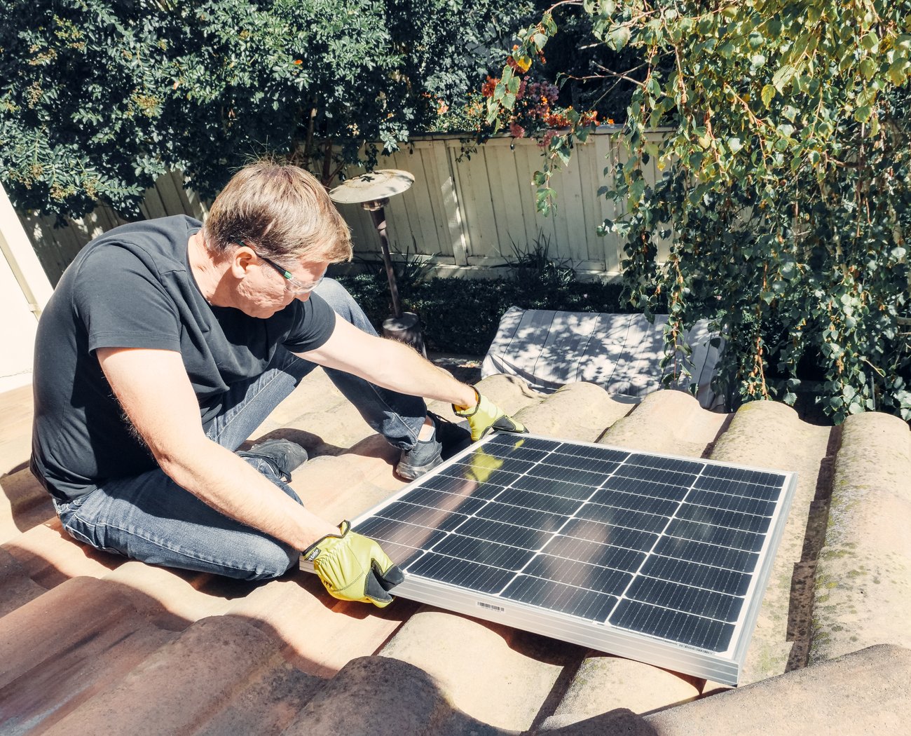 Image of Man Installing Solar Panels